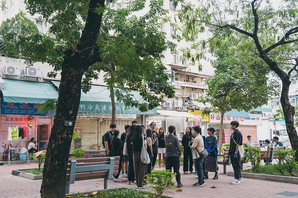 Students walking through Tuen Mun on a collection round